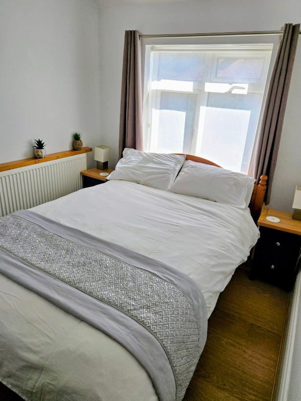 Master bedroom with coastal decor